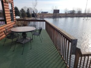 Exterior photo of the deck and the beautiful view in Winner, South Dakota at the best pheasant hunting lodge.